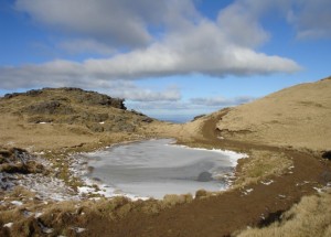 Frozen tarn along the route