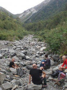 Having a breather while re-grouping on the Waipawa River bank