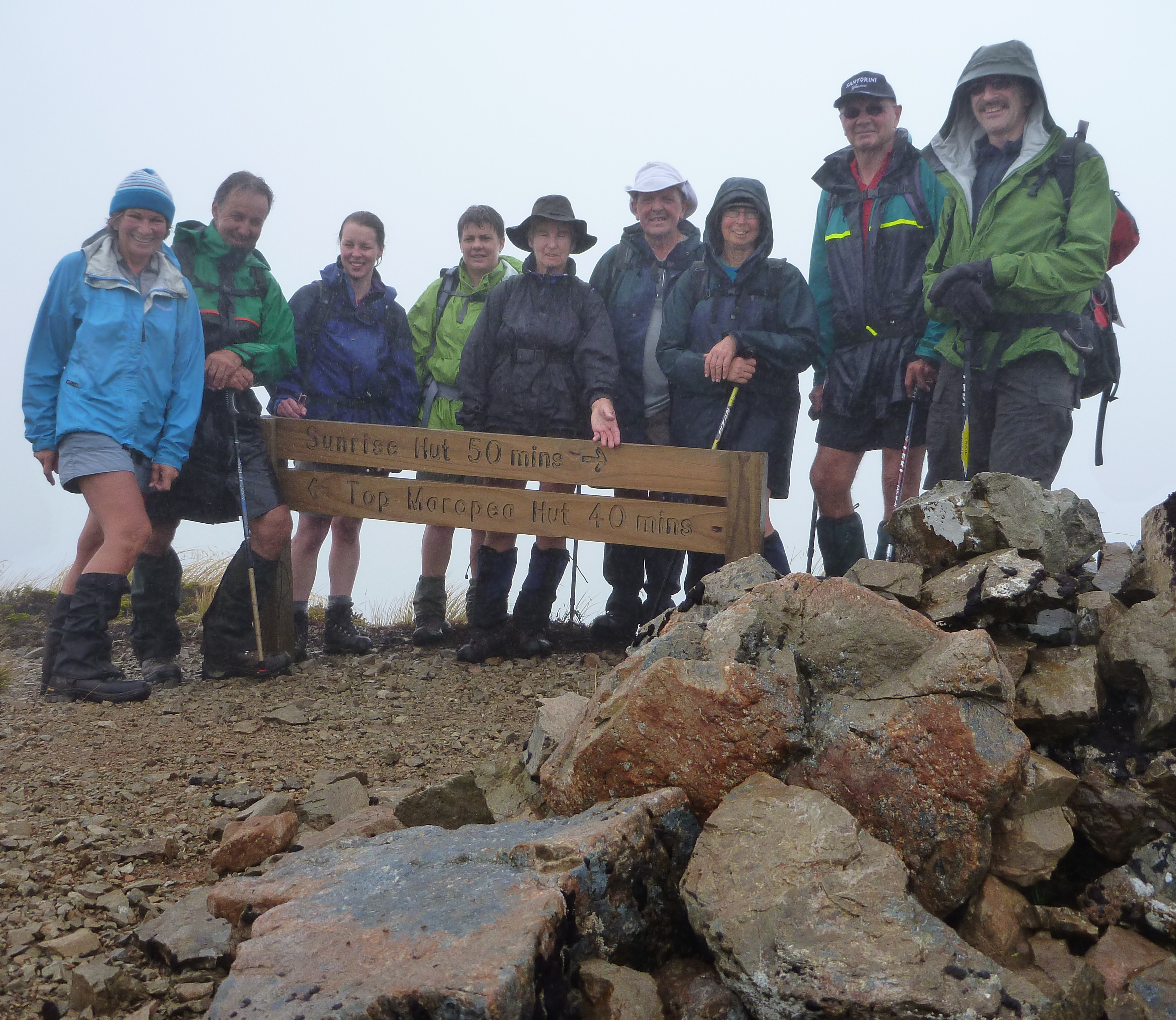The wet but still smiling trampers to Top Maropea Hut
