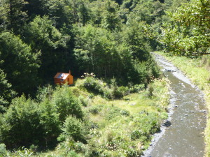 The hut, taken from the steep track approaching the valley bottom