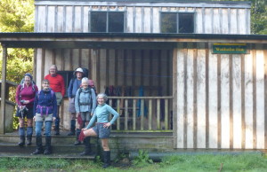 Waihaha Hut with the six trampers